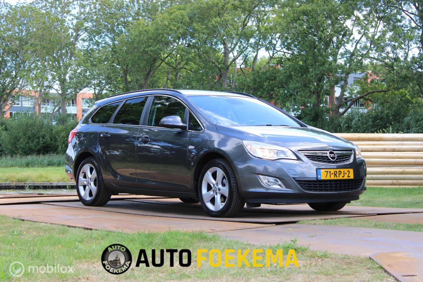 Opel Astra Sports Tourer - 1.4 Turbo Edition LEKT OLIE - AutoWereld.nl