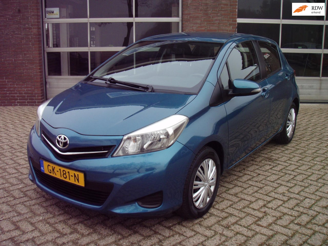 Toyota Yaris - 1.3 VVT-i Aspiration NAVI AIRCO ACHTERUITRIJCAMERA INF 0651503487 - AutoWereld.nl