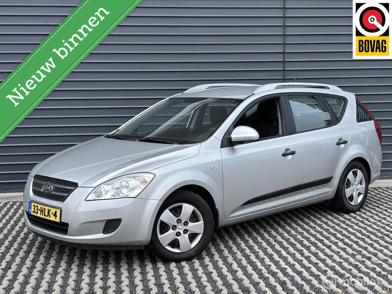 Kia Cee'd Sporty Wagon - 1.4 X-tra | 1e eigenaar | Trekhaak - AutoWereld.nl