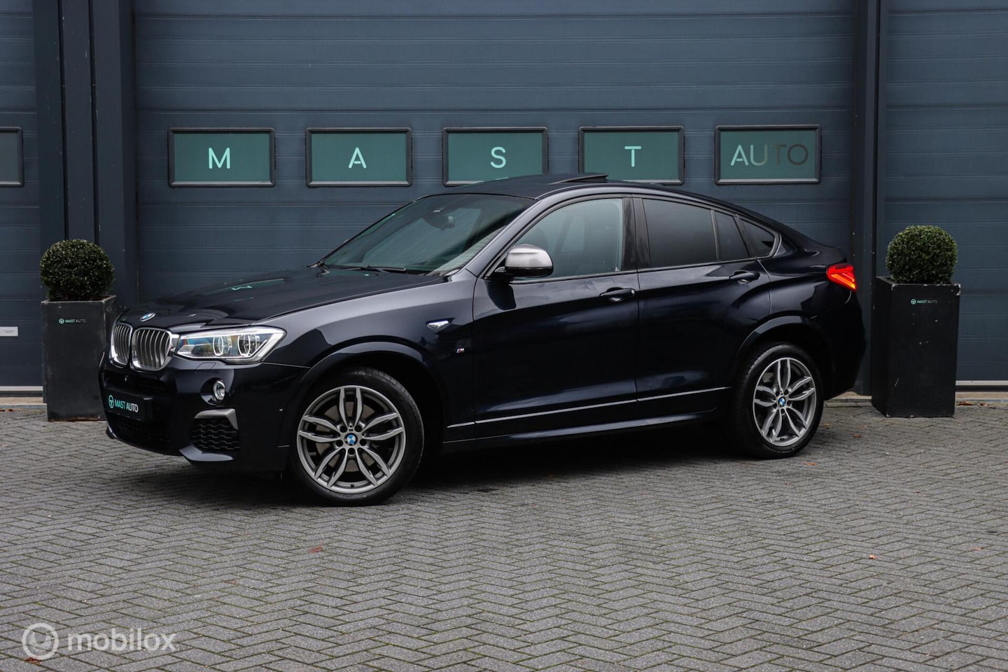 BMW X4 - M40i High Executive|HUD|H&K|Schuifdak|Leder|Camera - AutoWereld.nl