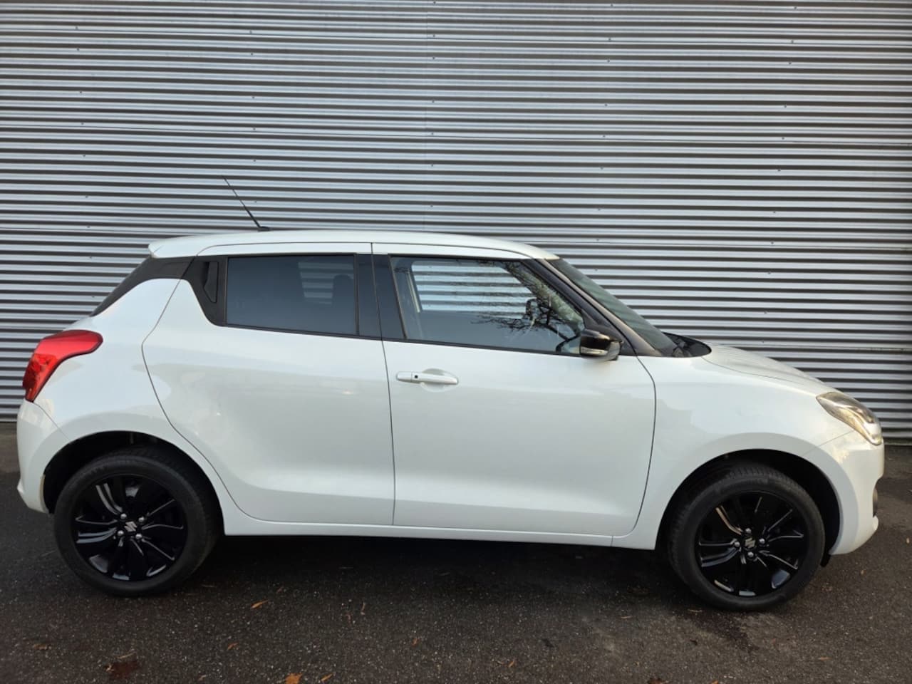 Suzuki Swift - 1.2 Select All Grip - AutoWereld.nl