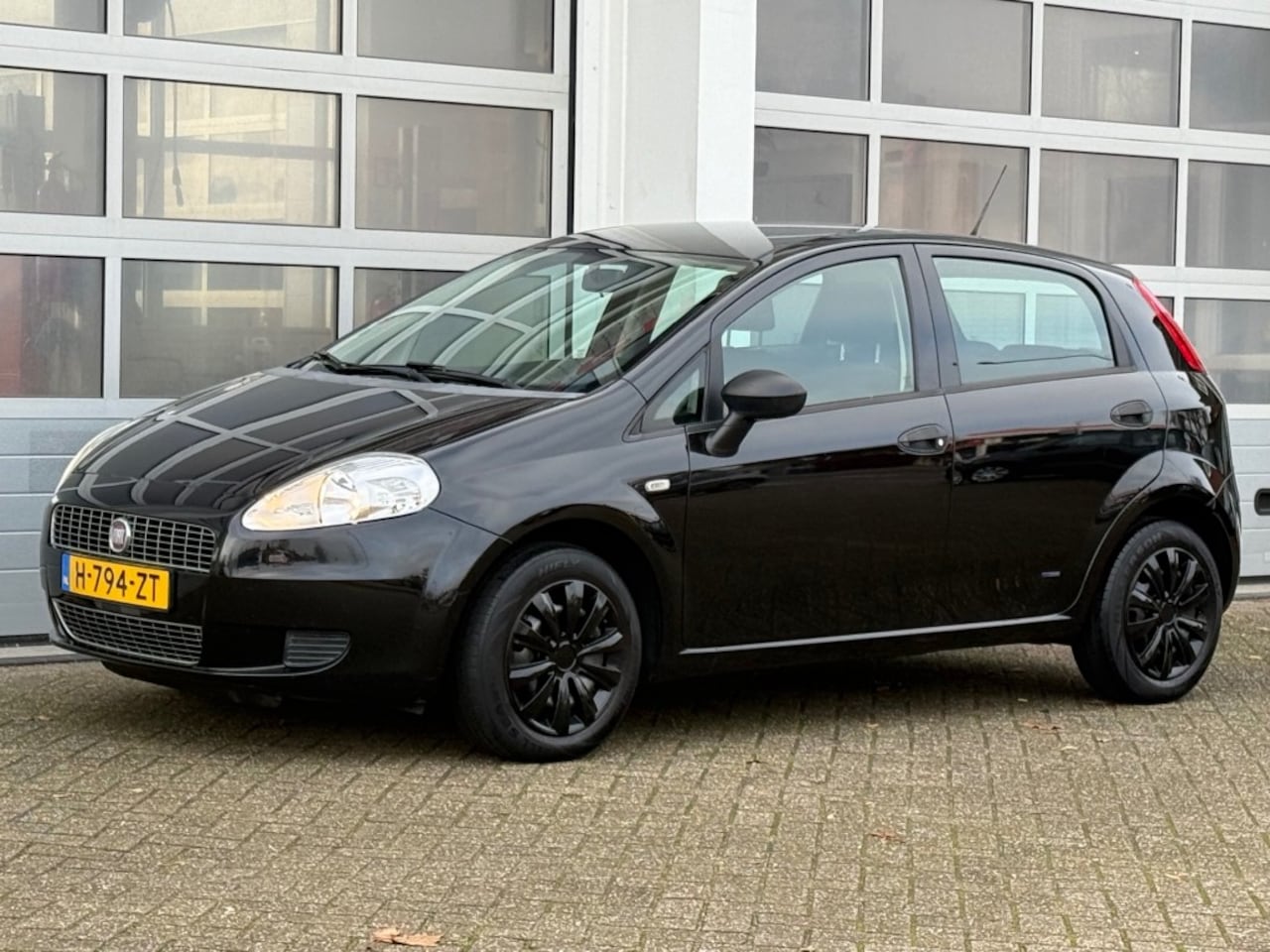 Fiat Punto Evo - 1.4 Business 77PK 5-Drs Airco Radio APK tot 09-2026 - AutoWereld.nl