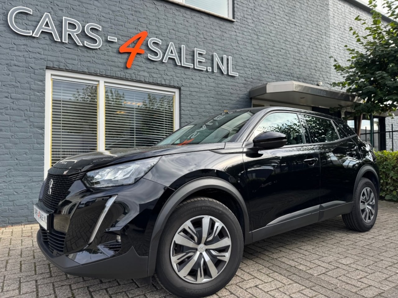 Peugeot 2008 - 1.2 Active Business + Led + Camera + Nav + Car-play - 10/2021 - AutoWereld.nl