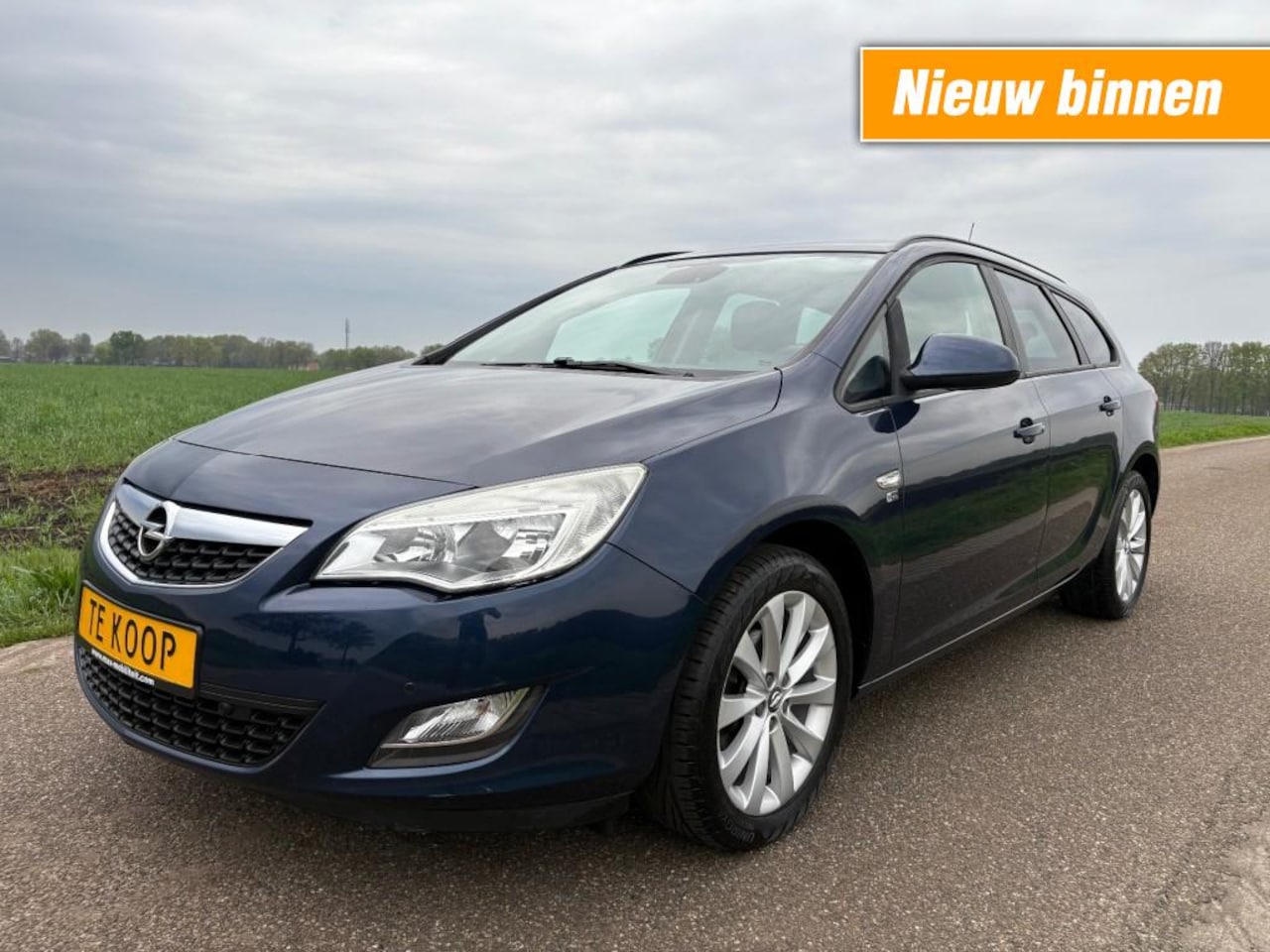 Opel Astra - 1.4 150 JAAR EDITIE / AIRCO / CRUISE / LEDER / VOLL - AutoWereld.nl
