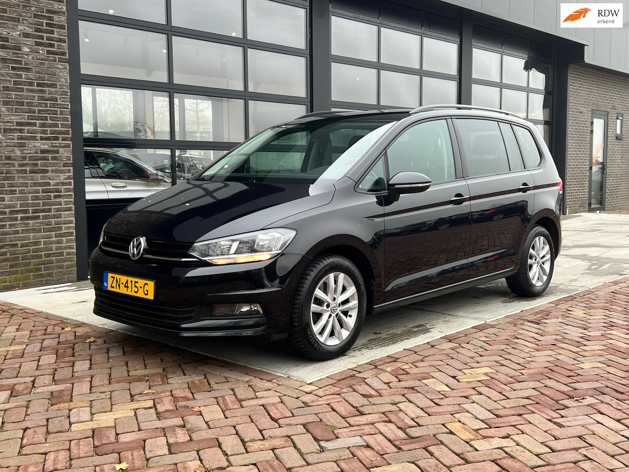 Volkswagen Touran - 1.2 TSI Trendline 7p | Clima | Navi | CarPlay | Cruise | - AutoWereld.nl