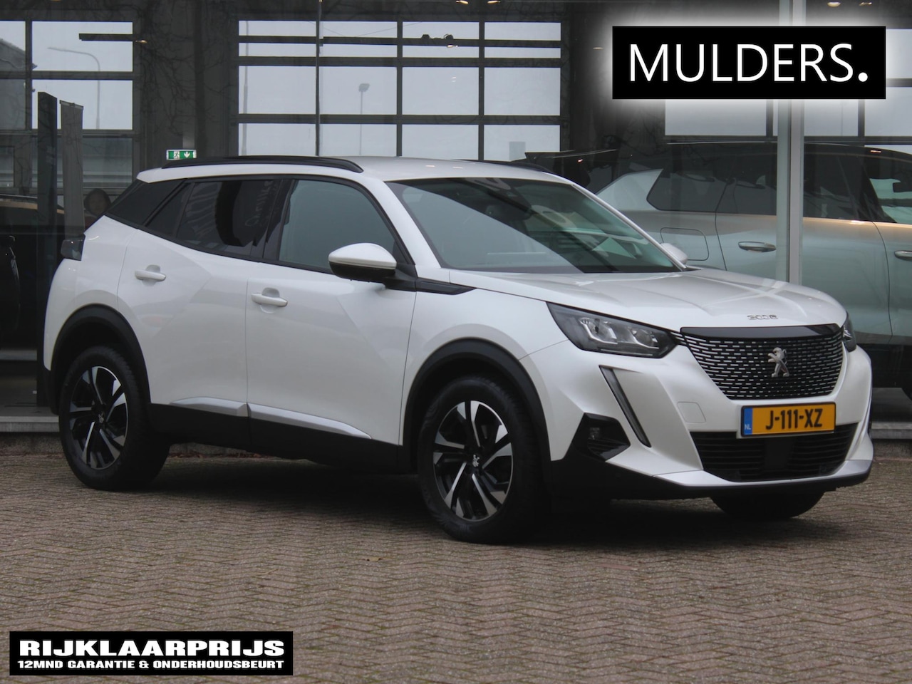 Peugeot 2008 - 1.2 PT Blue Lease Allure | Camera / Navi / Climate / Cruise - AutoWereld.nl