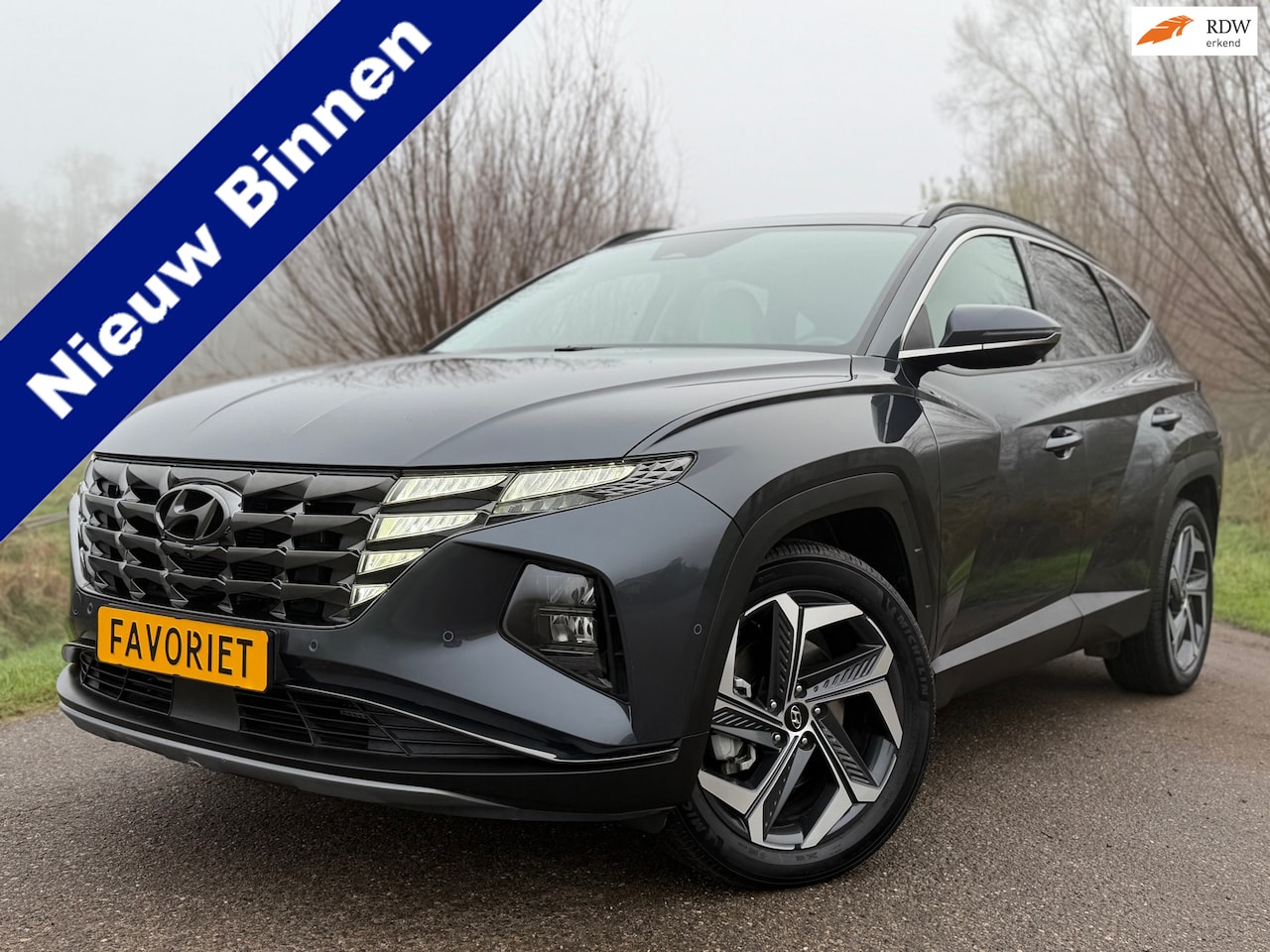 Hyundai Tucson - 1.6 T-GDI PHEV Comfort Smart 4WD / Incl. BTW / Panoramadak / Camera / Leder / Zeer Complet - AutoWereld.nl