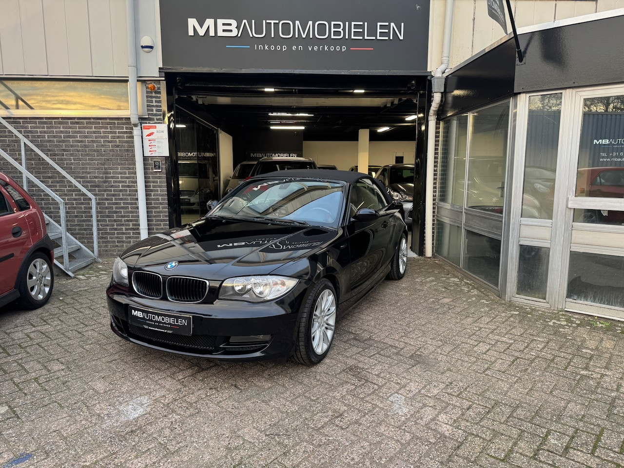 BMW 1-serie Cabrio - 118i/Cabrio/Zwart'/Bom voll Opties/Carplay/APK/nette Auto!! - AutoWereld.nl