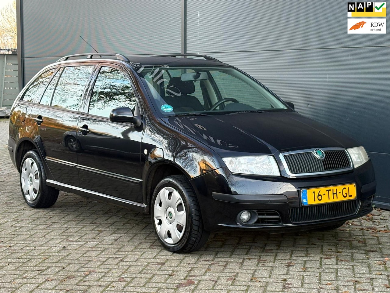 Skoda Fabia Combi - 1.4-16V Spirit+ AIRCO CRUISE TREKHAAK PDC - AutoWereld.nl