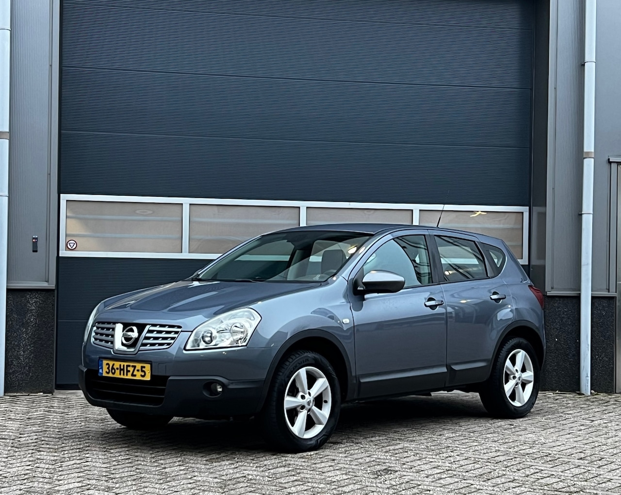 Nissan Qashqai - 2.0 Acenta bj.2009 Airco|Trekh|Pdc|Apk.1-2027. - AutoWereld.nl