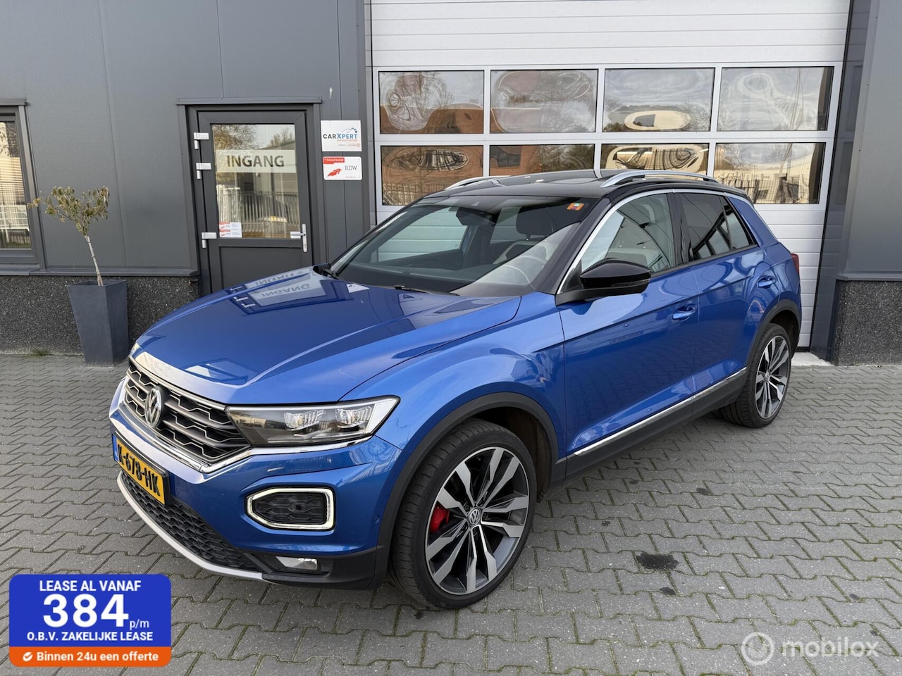 Volkswagen T-Roc - 2.0 TSI 4Motion Sport / Pano / ACC / DCC - AutoWereld.nl