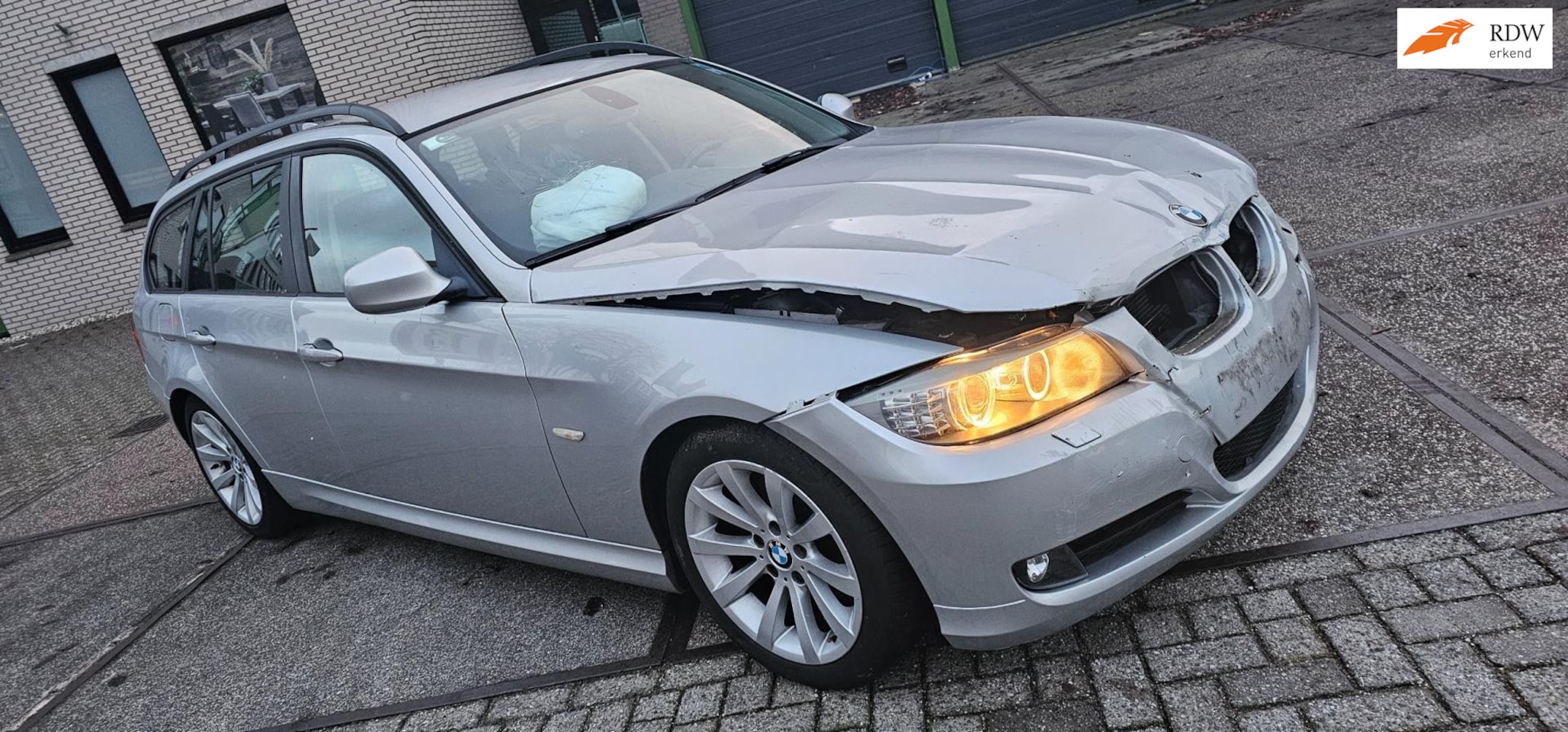 BMW 3-serie Touring - 320d High Executive aut rijdbare schade - AutoWereld.nl