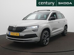 Skoda Karoq - 1.5 TSI ACT Sportline Business Navigatie - 19 Inch - Panoramadak - Automaat - Leer - Trekh