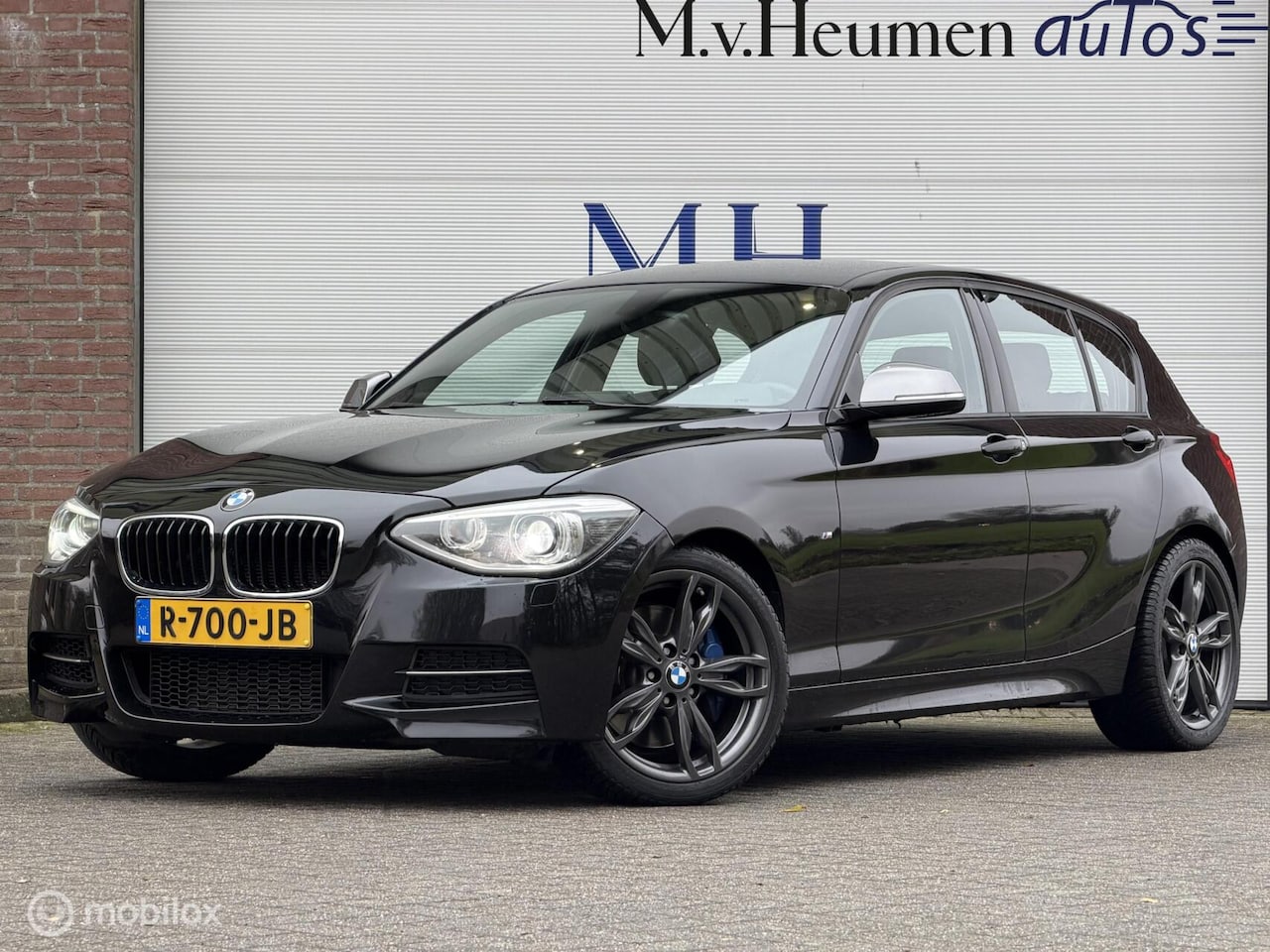 BMW 1-serie - M135i xDrive 320PK Harman Kardon LED Climate Super Nette Auto - AutoWereld.nl