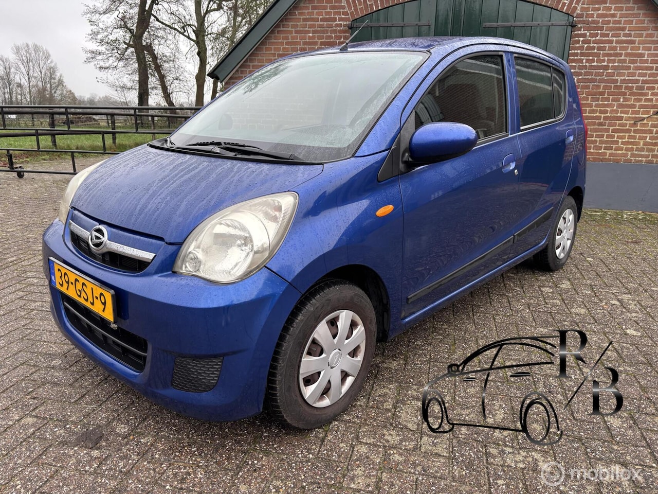 Daihatsu Cuore - 1.0 Premium AIRCO - AutoWereld.nl