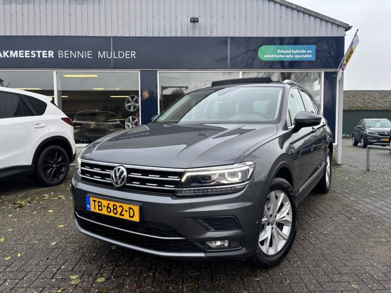 Volkswagen Tiguan - 1.4 TSI DSG AUT. / SCHUIFDAK / 21.799 KM NAP / LED - AutoWereld.nl