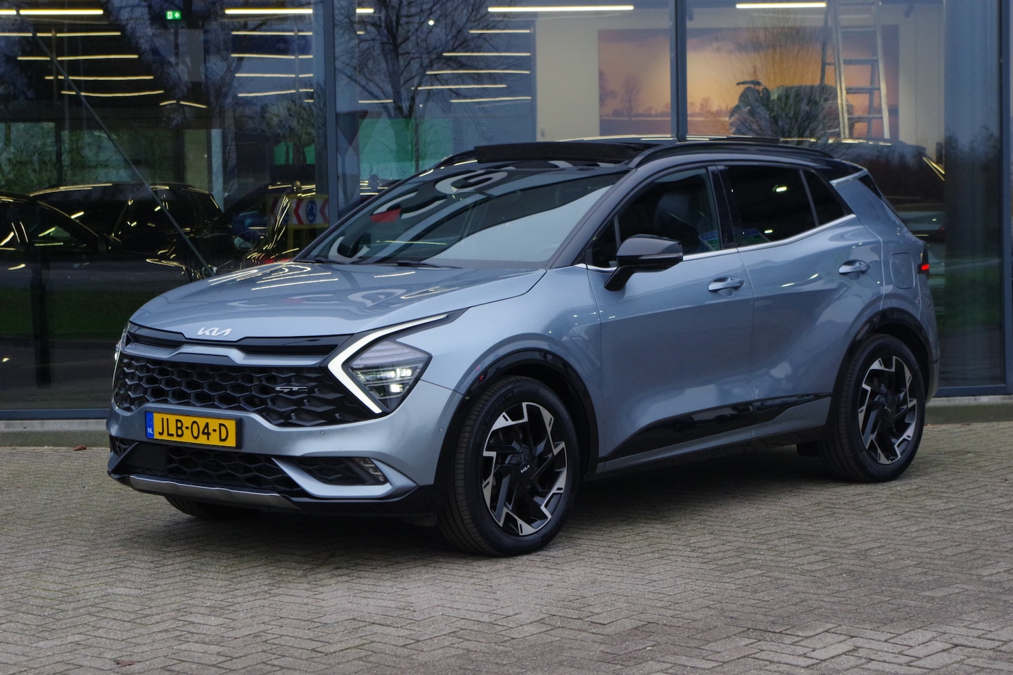 Kia Sportage - 1.6 T-GDi Plug-in Hybrid AWD GT-PlusLine 1.6 T-GDi Plug-in Hybrid 266 PK AWD GT-PlusLine, Trekhaak, Panoramadak, Rondomzicht Camera - AutoWereld.nl