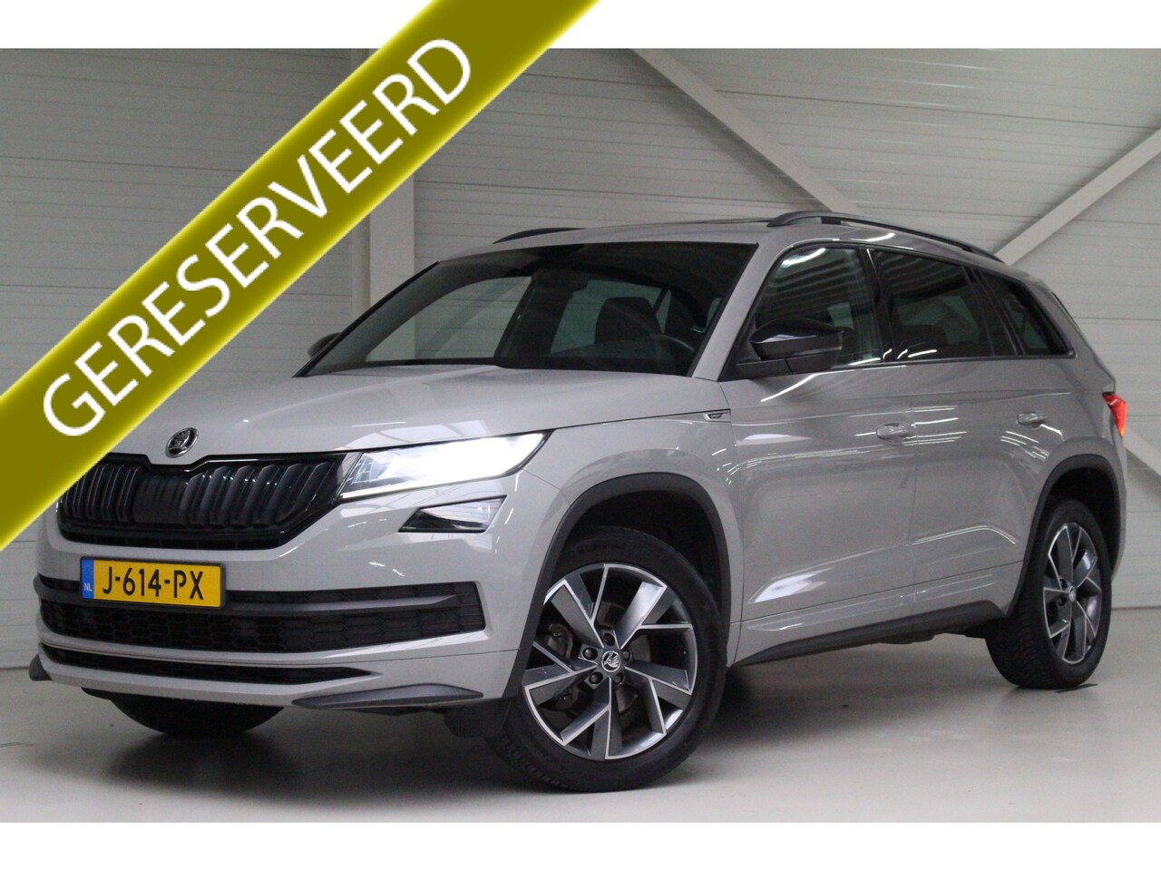 Skoda Kodiaq - 1.5 TSI Sportline Business 7p. Navigatie | Panoramadak | Trekhaak | El. stoelverstelling | - AutoWereld.nl