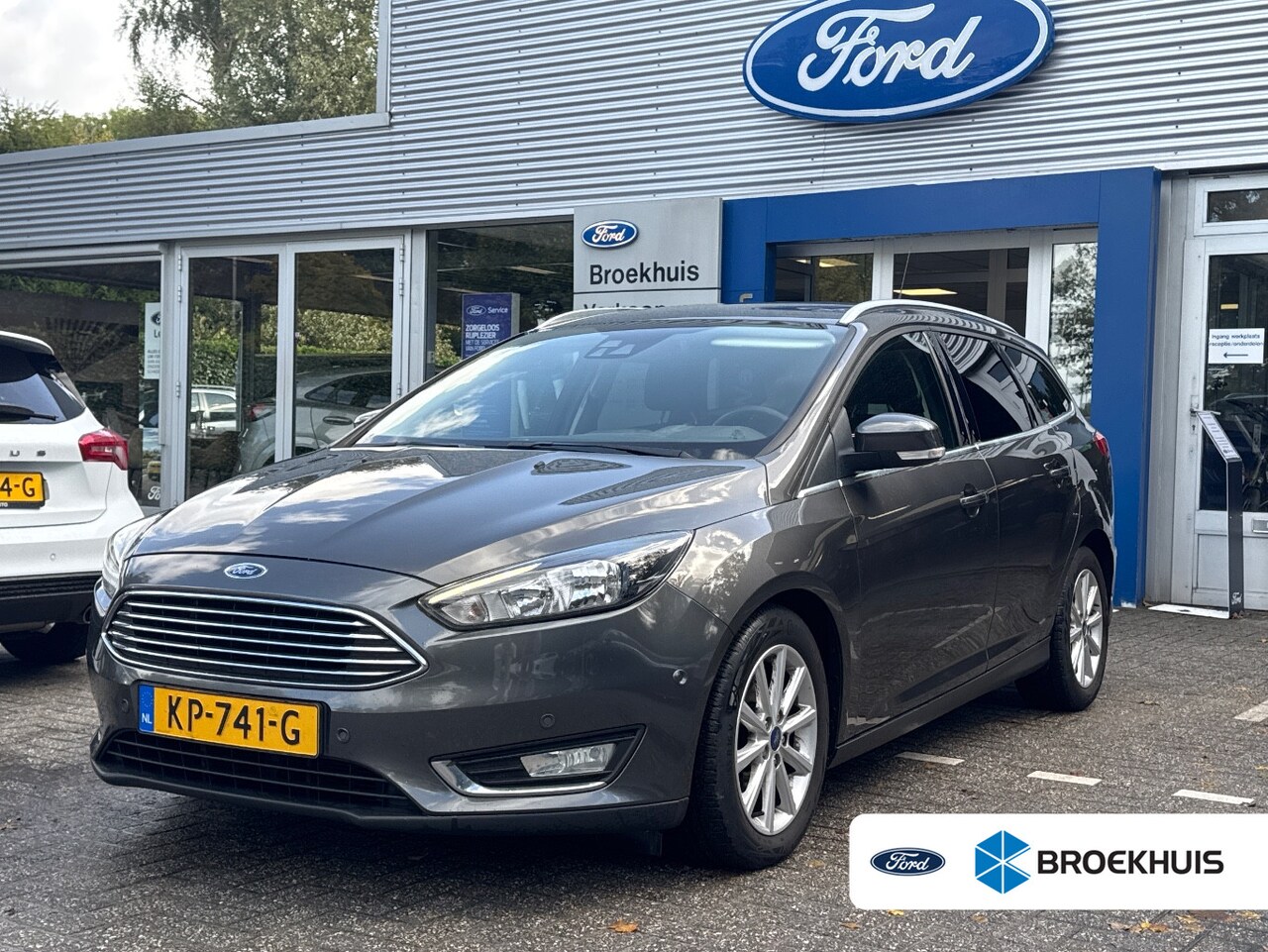 Ford Focus Wagon - 1.0 125PK TITANIUM | DEALER OH! | STOEL + STUURVERWARMING | NAVI | CLIMA | CRUISE | TREKHA - AutoWereld.nl