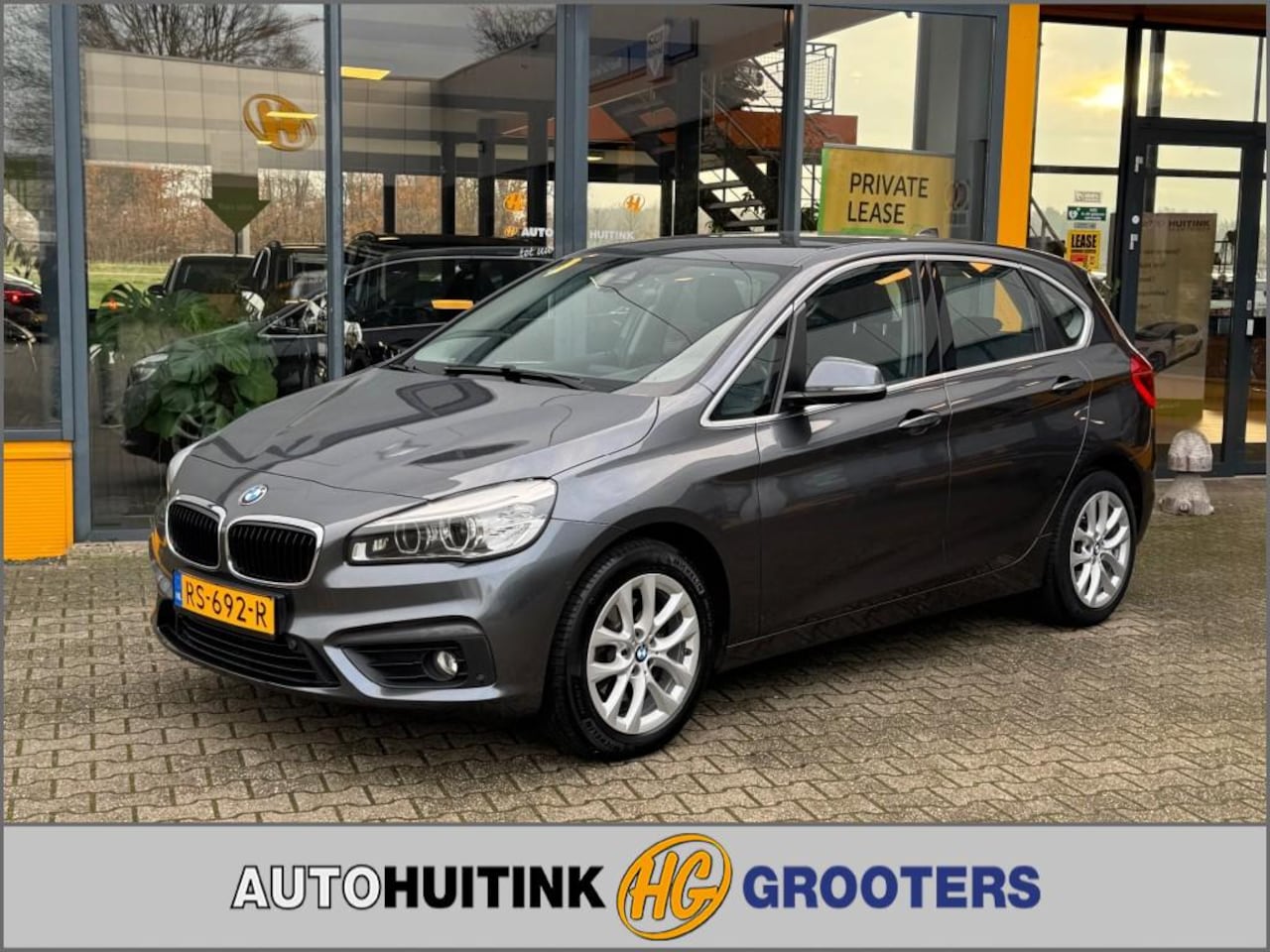 BMW 2-serie Active Tourer - 220i Centennial High Executive - stoelverwarming - navi - trekhaak - AutoWereld.nl