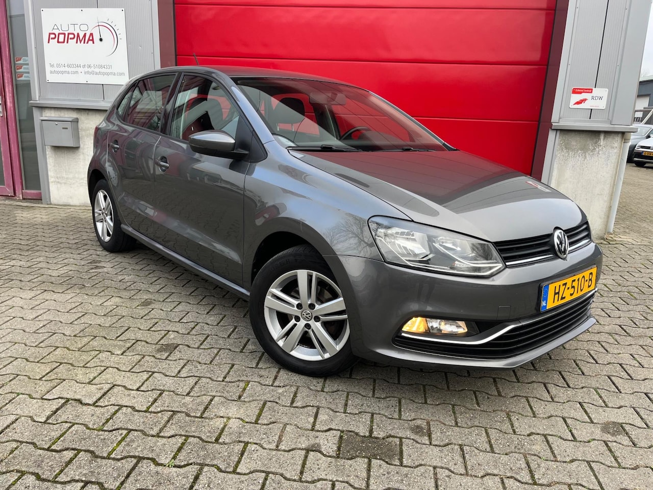 Volkswagen Polo - 1.2 TSI 90pk Comfortline / Airco / Cruise control / Trekhaak / LM velgen / reservewiel - AutoWereld.nl