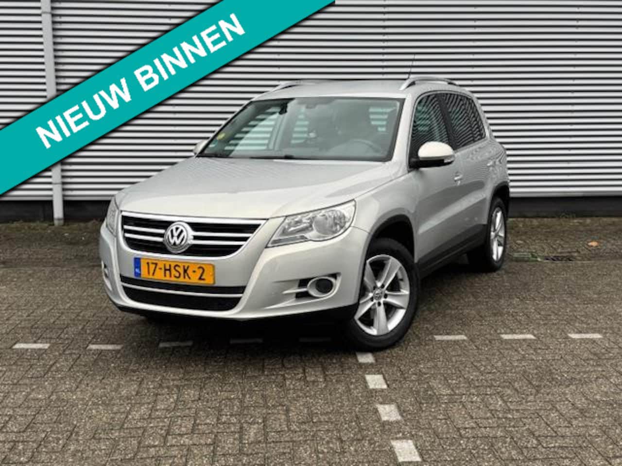 Volkswagen Tiguan - 2.0 TSI Sport&Style 4Motion,Automaat ,navigatie/camera,elec trekhaak,17inch LMV met 4 seas - AutoWereld.nl