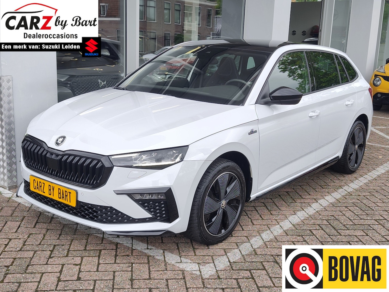 Skoda Scala - 1.0 TSI MONTE CARLO DSG Panoramadak | Keyless | Stuurwielverwarming - AutoWereld.nl