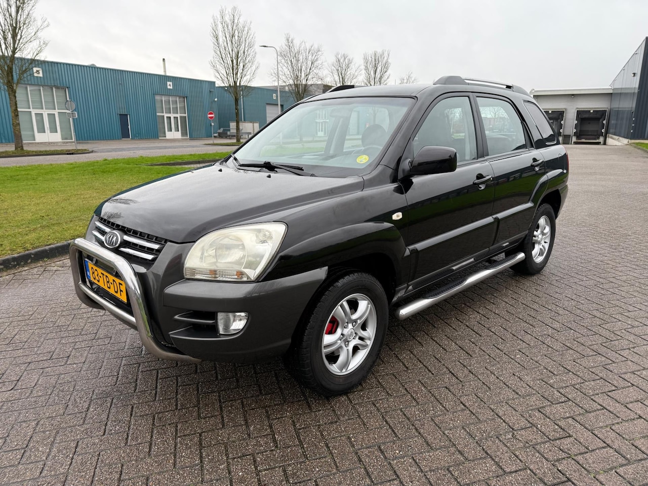 Kia Sportage - 2.0 CVVT Executive 2.0 CVVT Executive - AutoWereld.nl