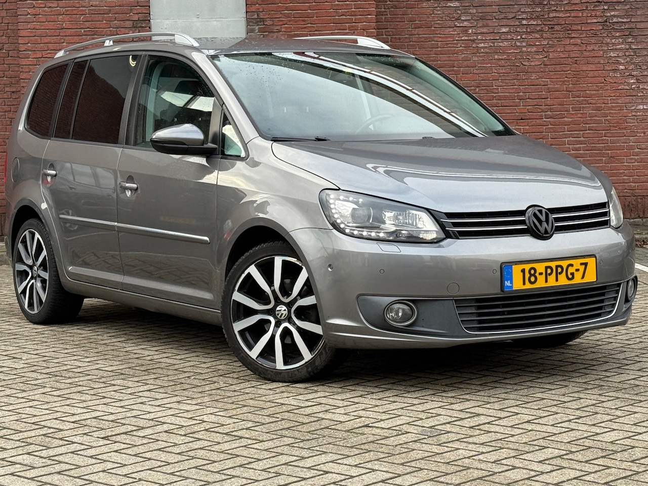 Volkswagen Touran - 1.4 TSI Highline|AUTOMAAT|NAVI|PDC|NIEUWE-MOTOR - AutoWereld.nl