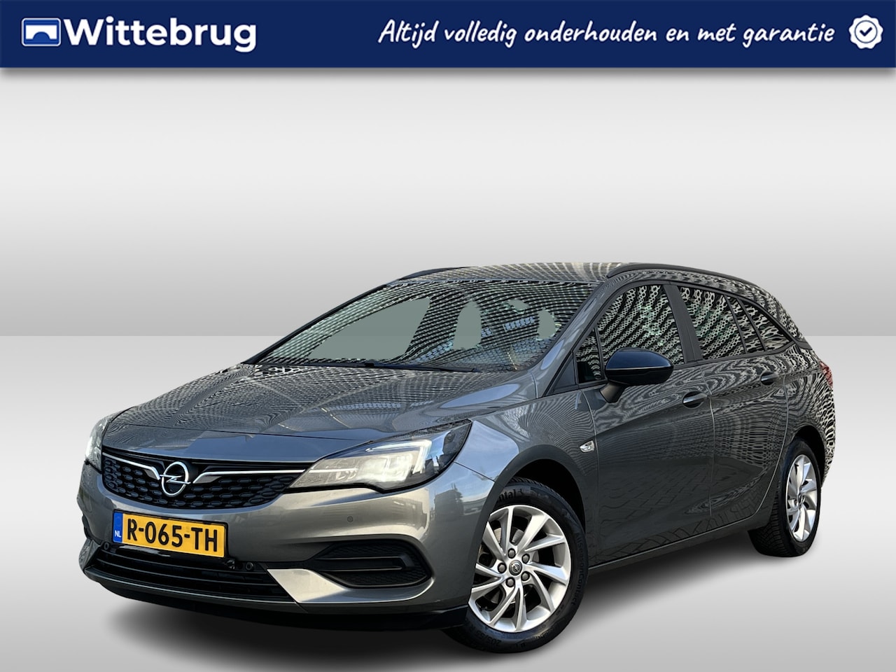 Opel Astra Sports Tourer - 1.2 Business Edition / Navigatie / App connect / Camera / Parkeersensoren V+A / Trekhaak / - AutoWereld.nl