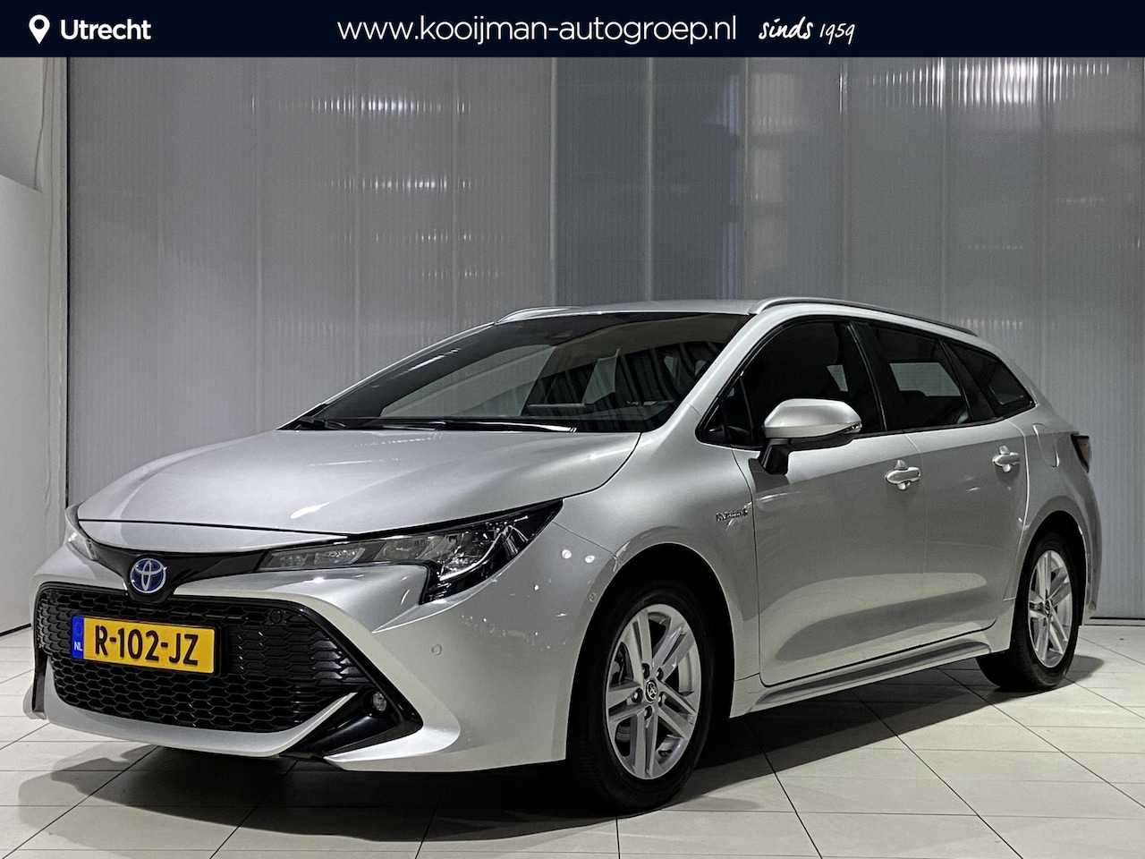 Toyota Corolla Touring Sports - 1.8 Hybrid Active | Stoelverwarming | Navi | Parkeerassistent | Toyota garantie tot 3-2031 - AutoWereld.nl