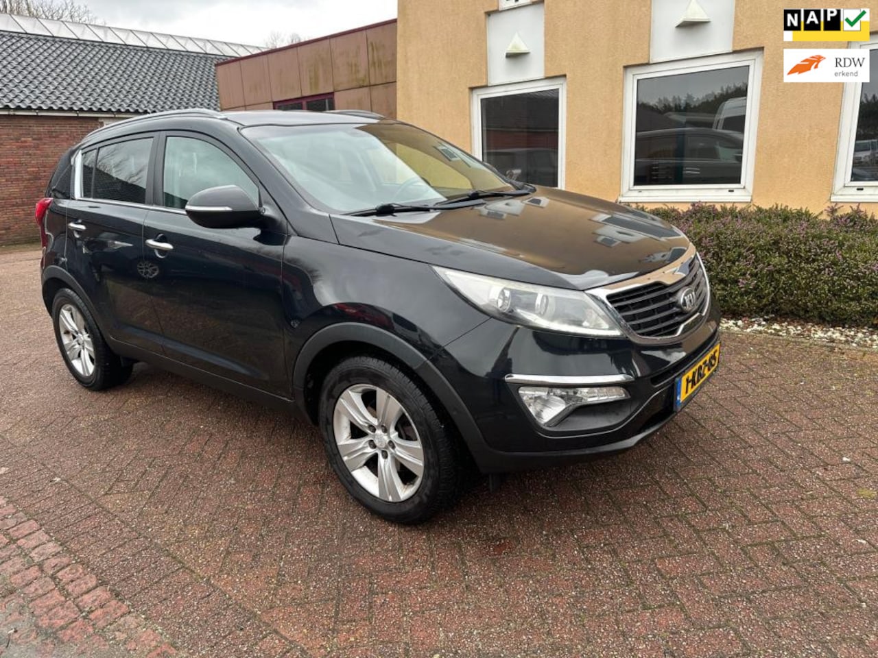 Kia Sportage - 1.6 GDI Plus Pack airco pdc nap dealer OH - AutoWereld.nl