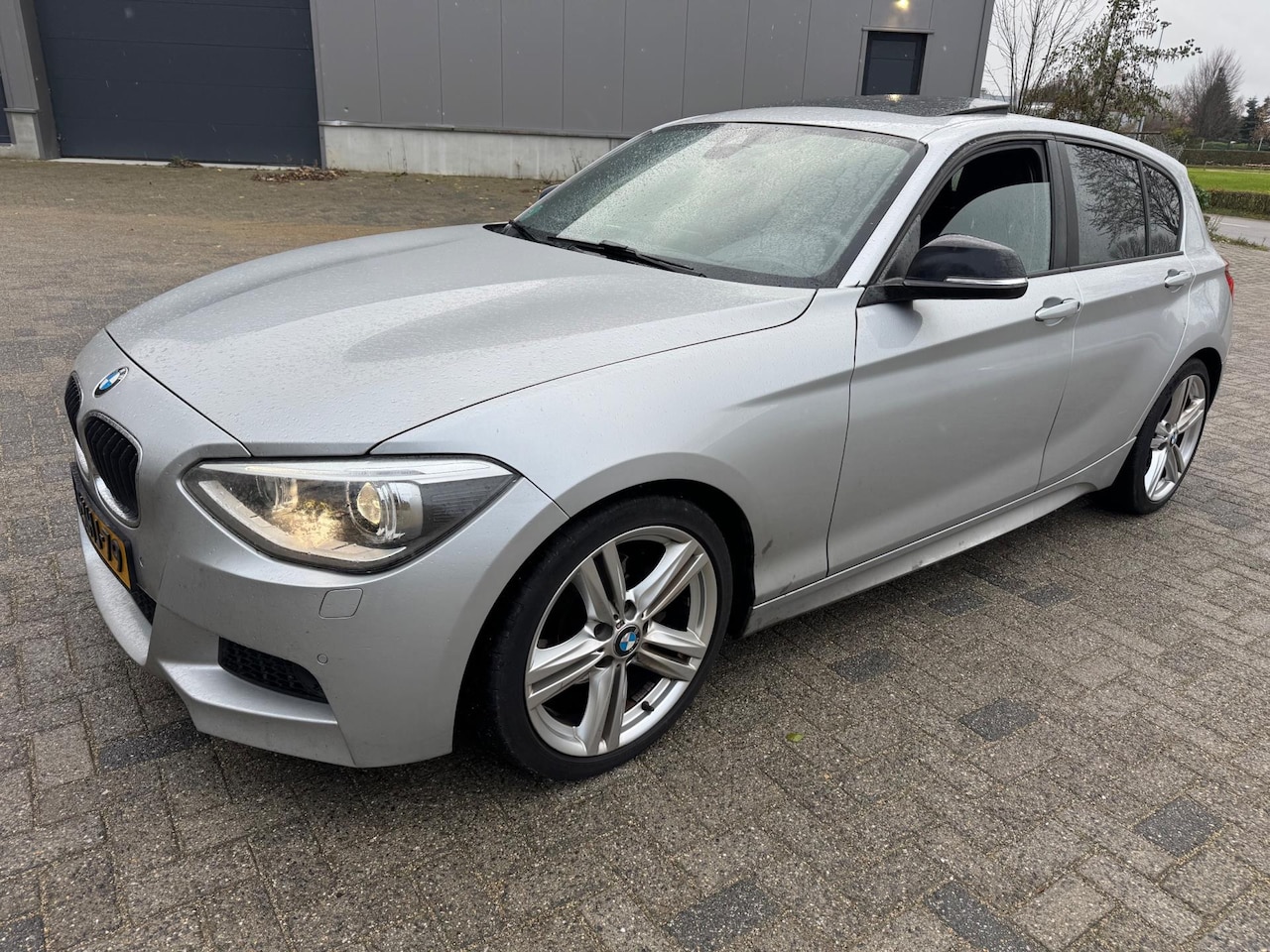 BMW 1-serie - 120d Business+ M-pakket Navi Leer Camera - AutoWereld.nl