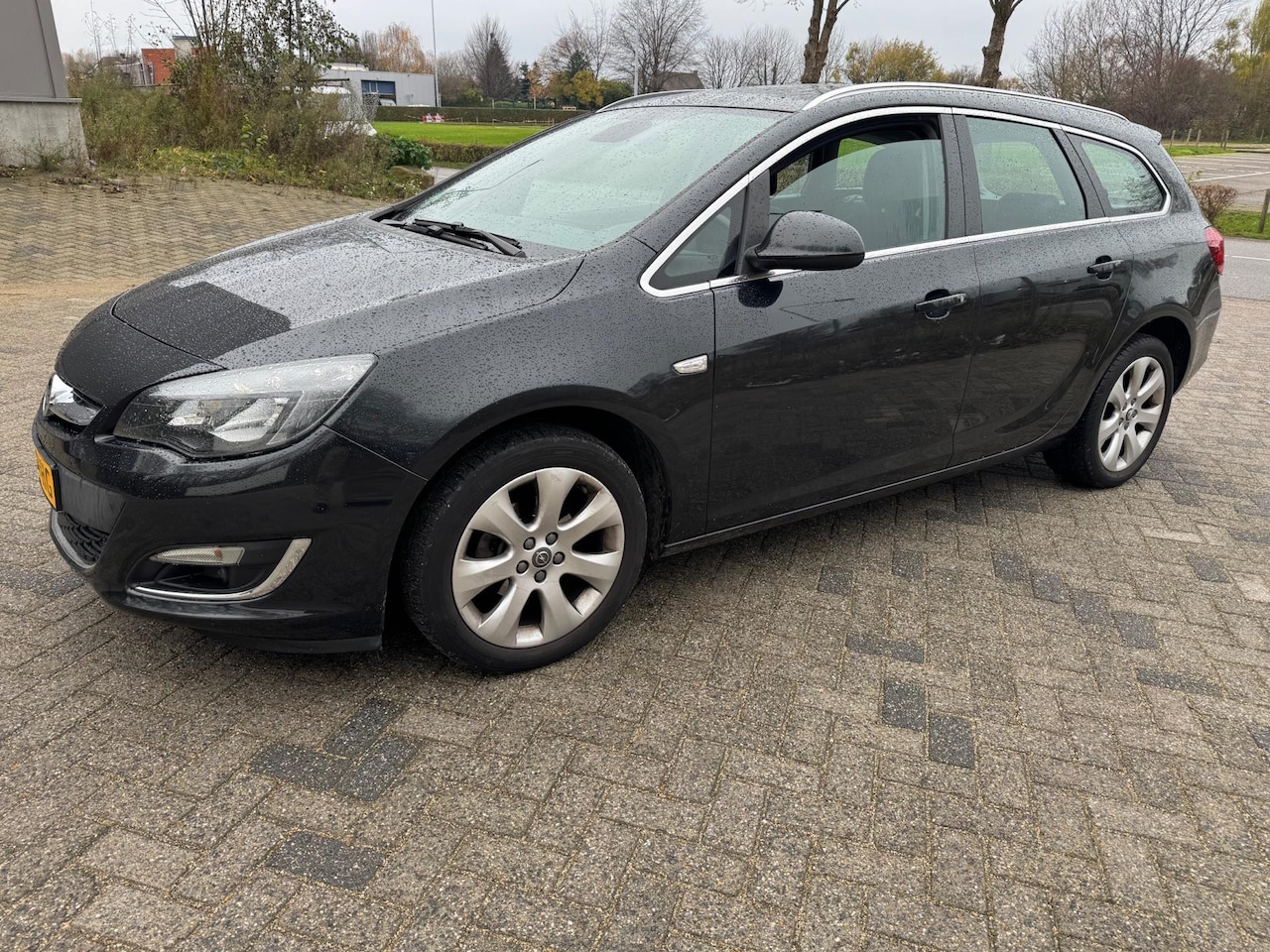 Opel Astra Sports Tourer - 1.4 Turbo Sport 1.4 Turbo Sport - AutoWereld.nl