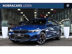 BMW 3-serie Touring - 330e High Executive M Sport Automaat / Panoramadak / Trekhaak / Sportstoelen / Adaptieve L