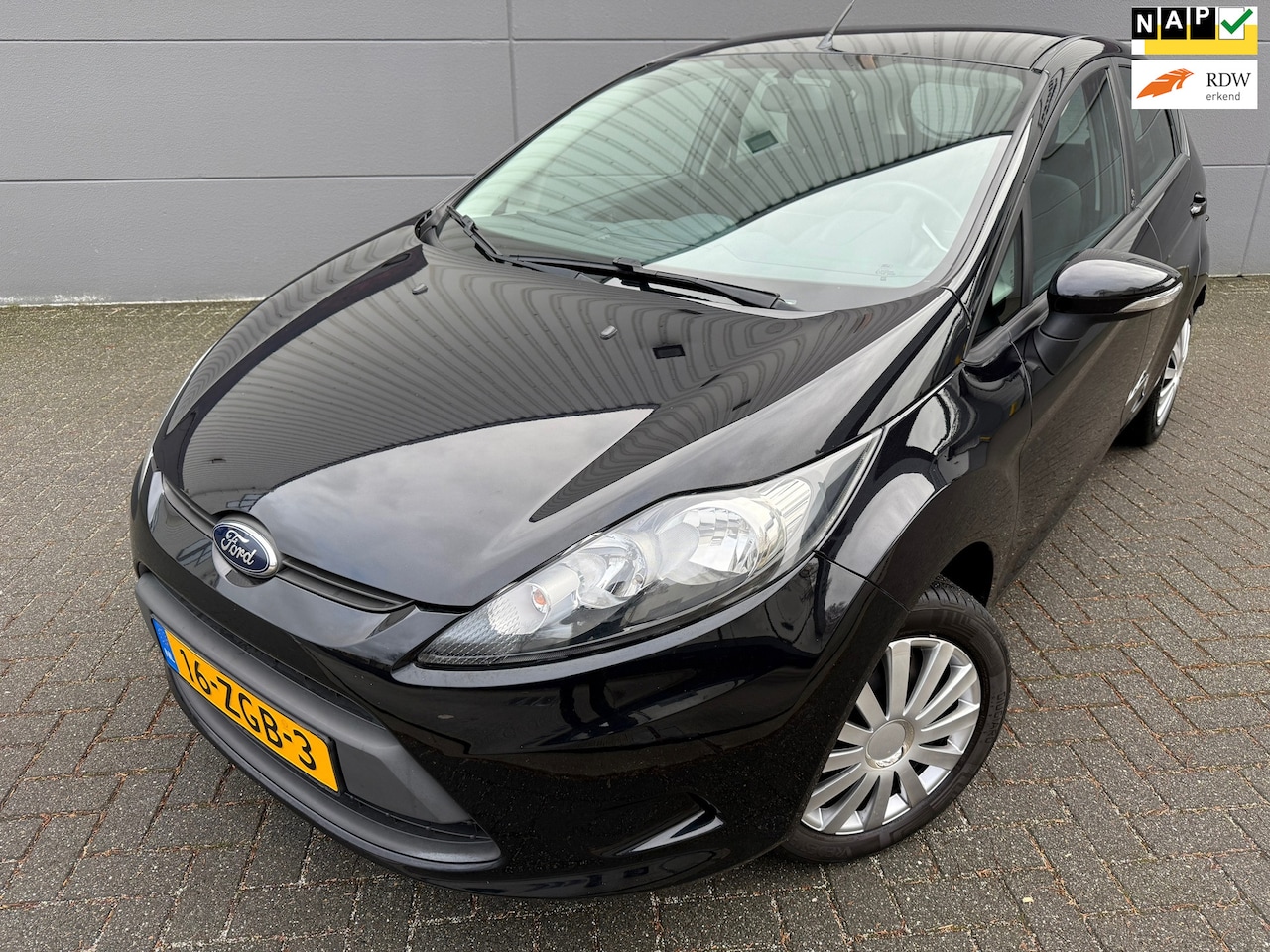 Ford Fiesta - 1.25 Champion*AIRCO*NEW APK*NAP*ELKT-RAAM*C-D AFSTAND* - AutoWereld.nl