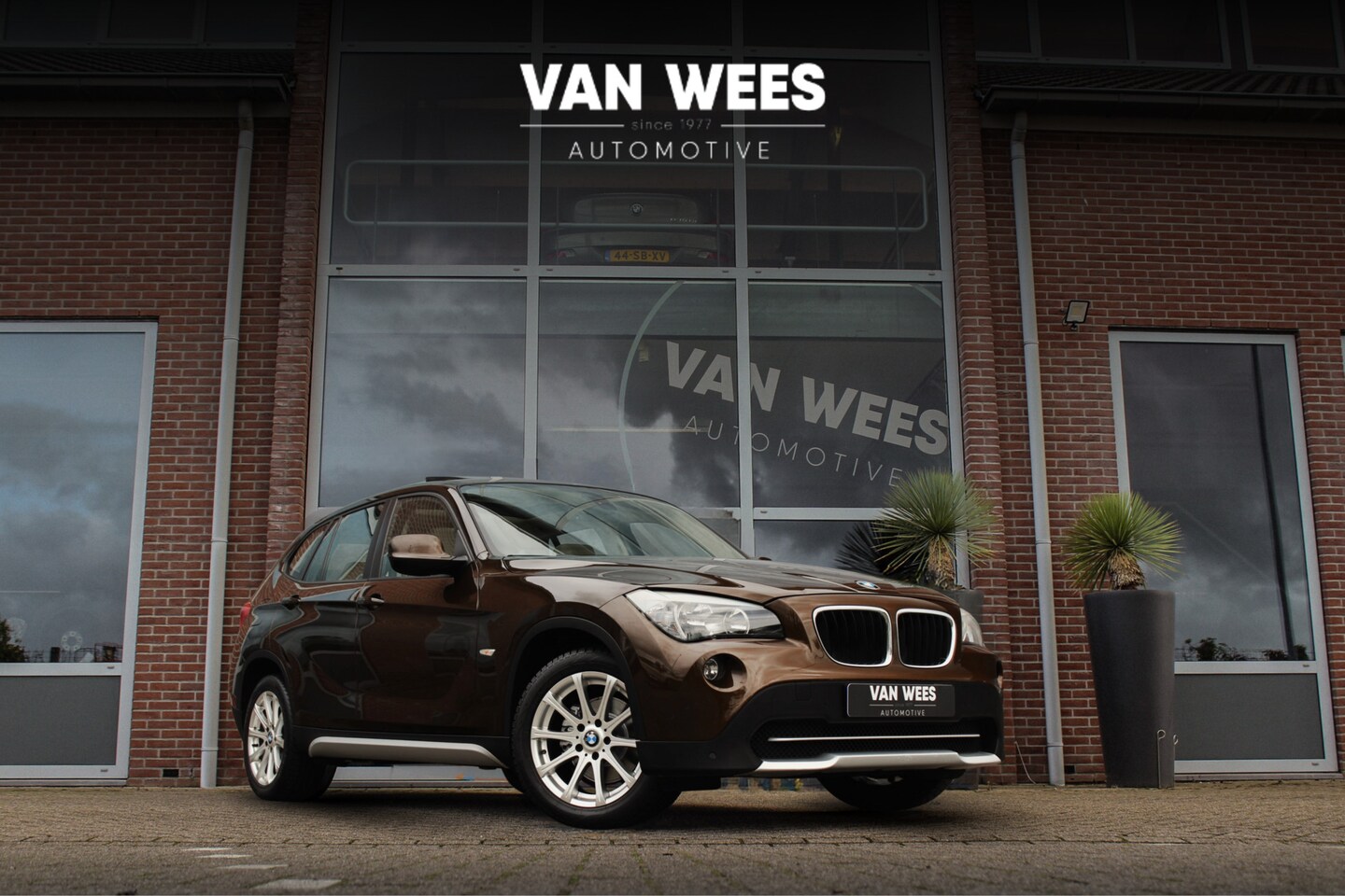 BMW X1 - sDrive18i E84 Executive | Automaat | Navi | 2e eigenaar | 17 inch | 150 pk | Dakraam | Blu - AutoWereld.nl