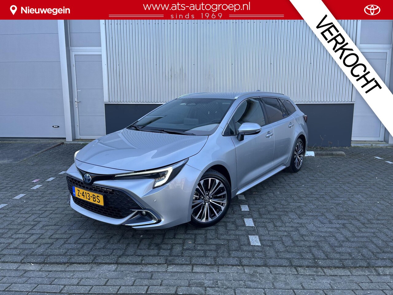 Toyota Corolla Touring Sports - 1.8 Hybrid First Edition | Electrische achterklep | Parkeersensoren V + A | Half lederen b - AutoWereld.nl