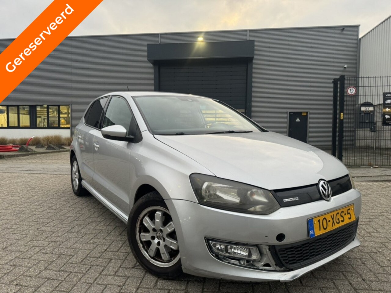 Volkswagen Polo - 1.2 TDI Bl.M. Comfl. Navi/Cruise/Clima - AutoWereld.nl