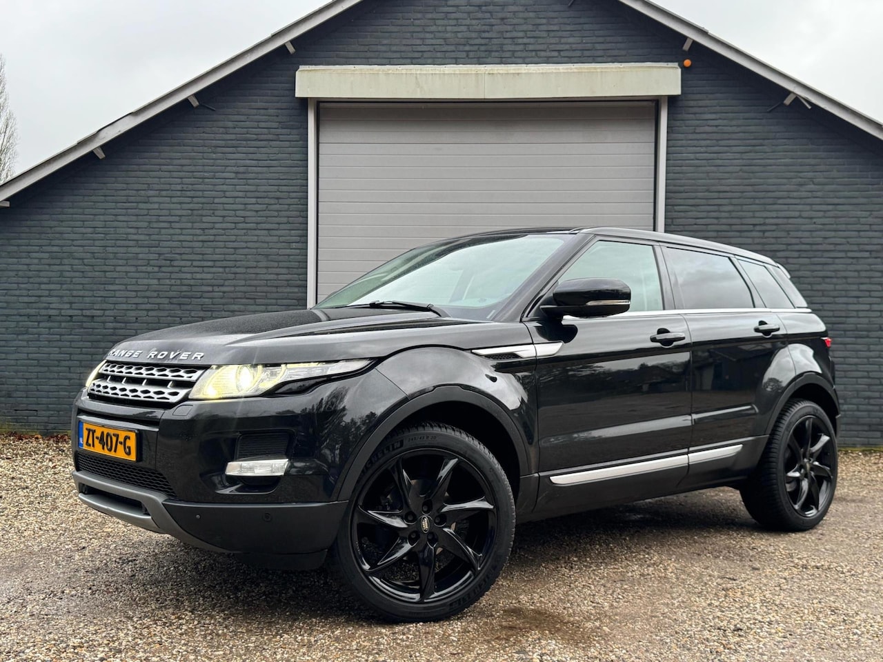 Land Rover Range Rover Evoque - 2.0 Si 4WD Leer/Panodak/Automaat DRIJFSTANGLAGER HOORBAAR - AutoWereld.nl