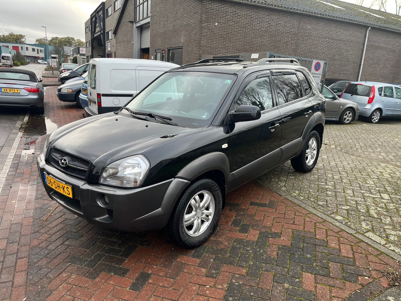Hyundai Tucson - 2.0i Style! Clima! Trekhaak! - AutoWereld.nl