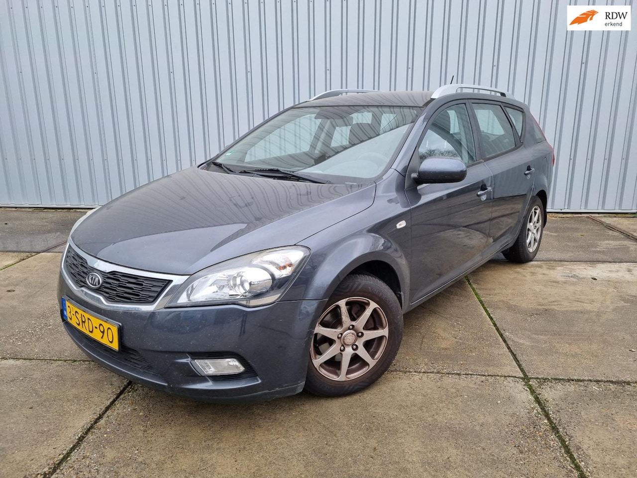 Kia Cee'd Sporty Wagon - 1.4 CVVT X-tra 1.4 CVVT X-tra - AutoWereld.nl