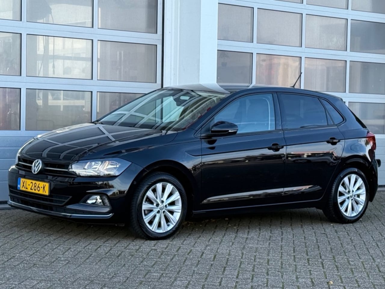 Volkswagen Polo - 1.0 TSI 116PK Highline Aut. Navi Pdc Trekhaak Rijklaar! - AutoWereld.nl