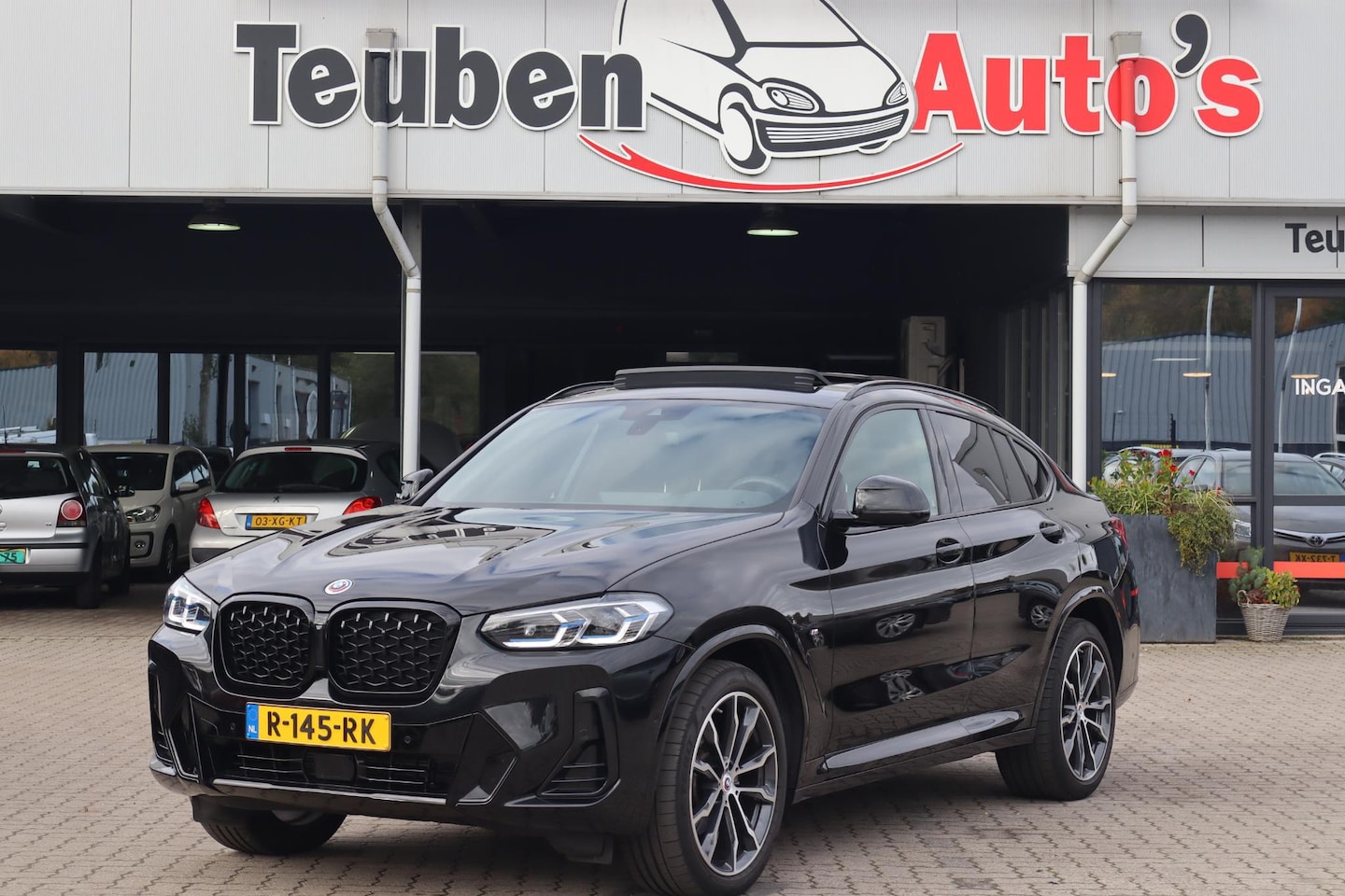 BMW X4 - xDrive20i Business Edition Plus BTW Auto, Lederen interieur, Panormadak, Schuif- kanteldak - AutoWereld.nl