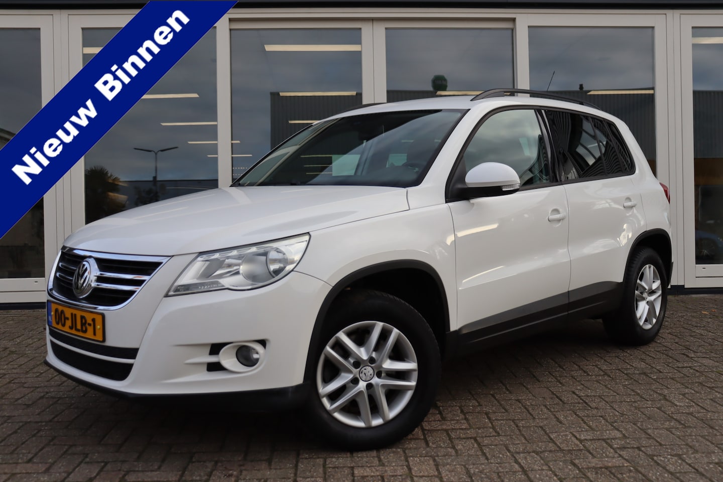 Volkswagen Tiguan - 1.4 TSI Comfort&Design, Cruise Control, Airco, Trekhaak, PDC A, Prijs Is Rijklaar Inclusie - AutoWereld.nl