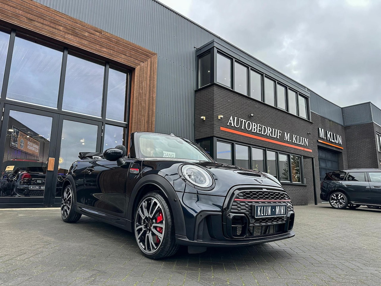 MINI Cabrio - Mini 2.0 John Cooper Works JCW Pack F1 aut 231pk/Union Jack dak/Bomvol/Btw - AutoWereld.nl