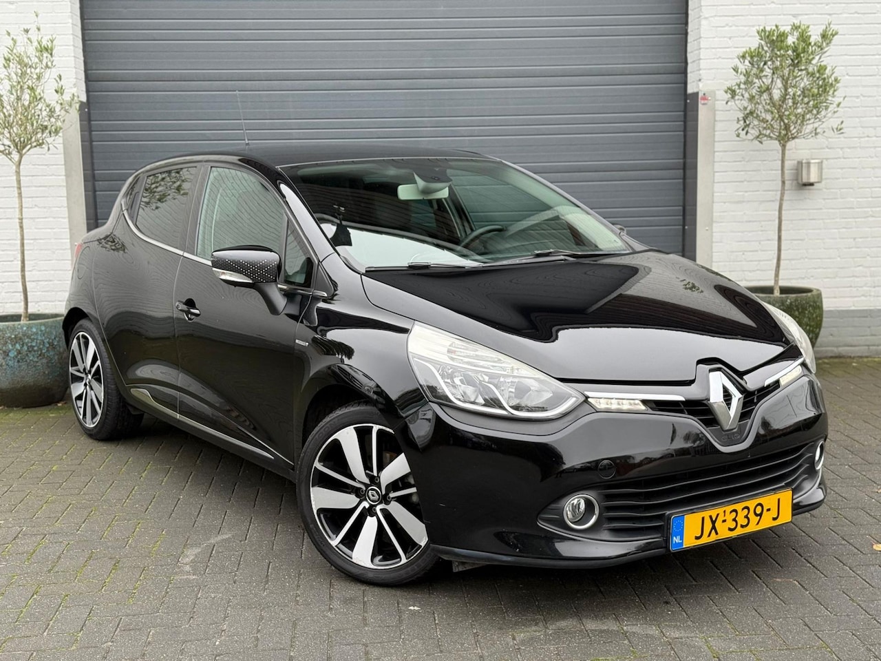 Renault Clio - 0.9 TCe Iconic | Leder | Cruise | Stoelverw. | PDC | Navigatie | - AutoWereld.nl