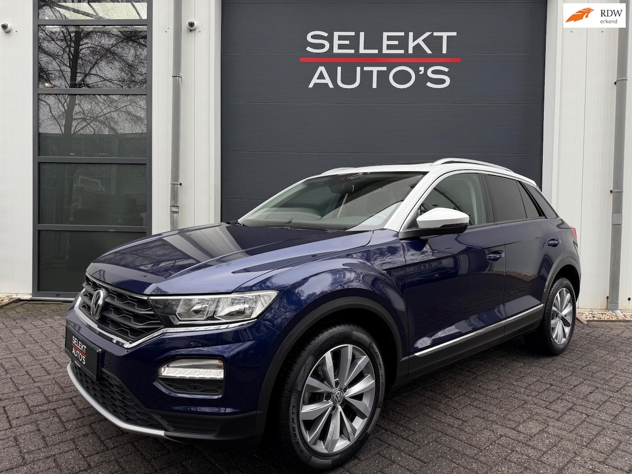 Volkswagen T-Roc - 1.0 TSI Style 116 Pk Panoramadak/Airco/ACC/Navigatie/PDC/Bluetooth/16 Inch/Elekt Ramen/Ele - AutoWereld.nl