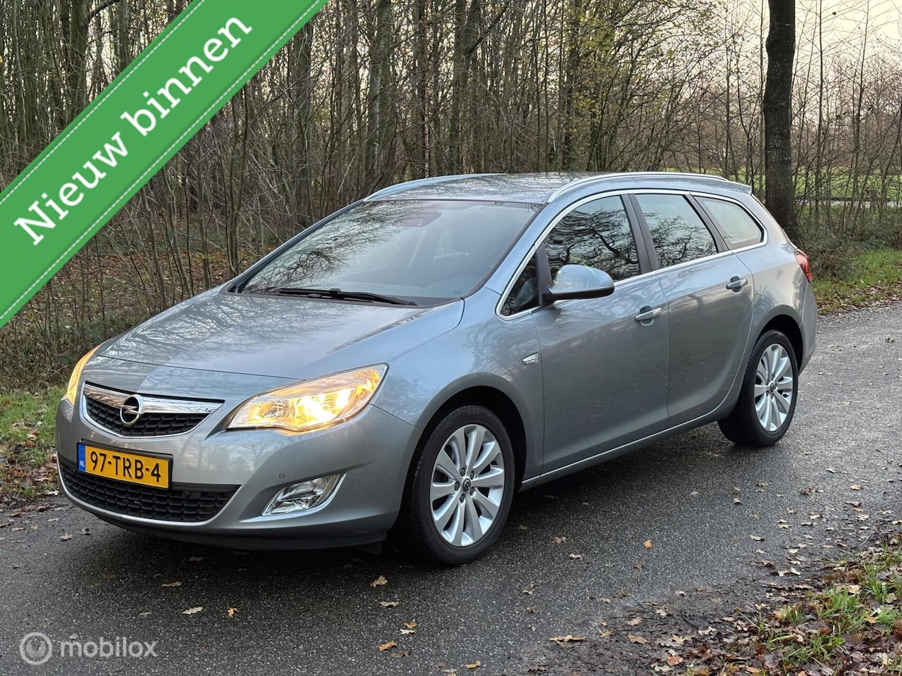 Opel Astra Sports Tourer - 1.4 Turbo | Navi | Pdc | Trekhaak - AutoWereld.nl