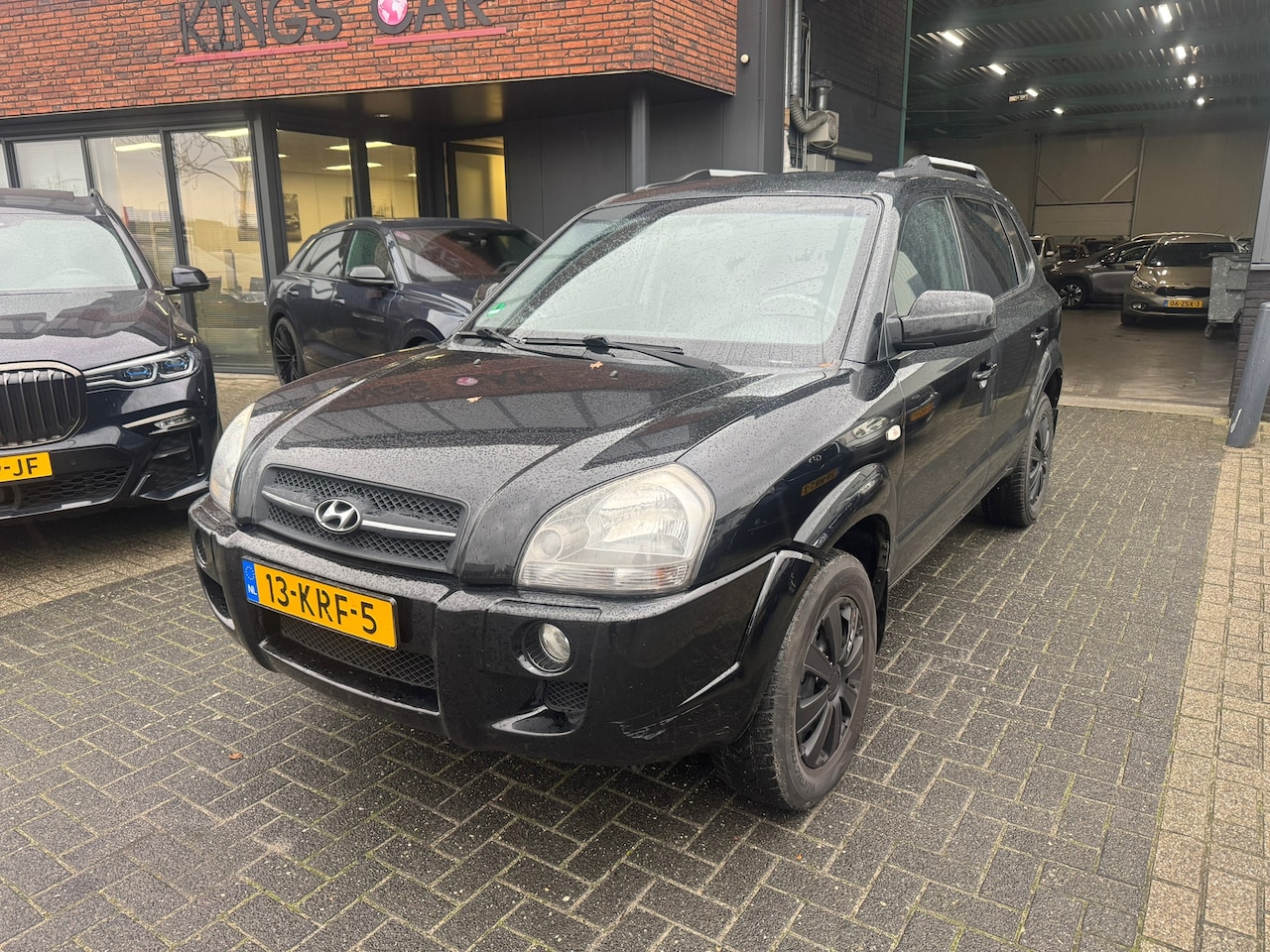 Hyundai Tucson - 2.0i Style CLIMA TREKHAAK LEDER STOEVERWARMING GOED ONDERHOUDEN - AutoWereld.nl